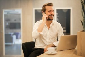 Professional on phone call at modern desk